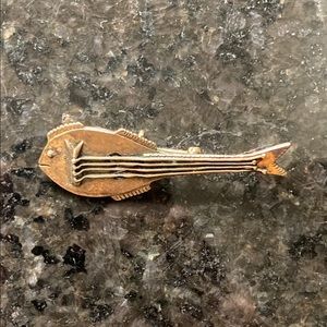 Fish guitar brooch from The Met Museum gift shop